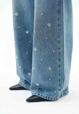 Jeans à haute taille et large jambe pour une silhouette classique et flatteuse