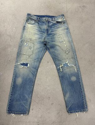 Le fond de denim léger avec une forte détresse pour un look vintage robuste