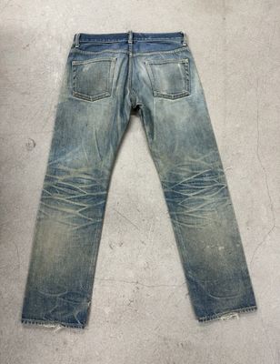 Le fond de denim léger avec une forte détresse pour un look vintage robuste